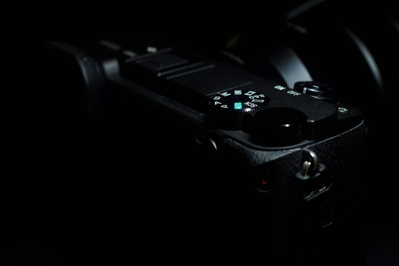 the view of a camera with its light on is shown in the dark
