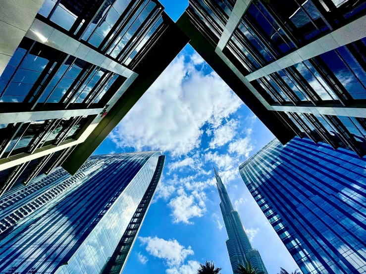 three large buildings that are standing next to each other