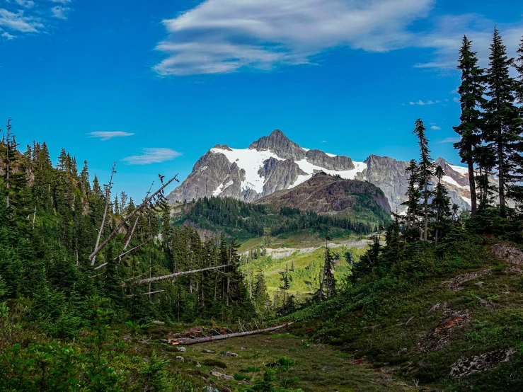 a scenic image of the mountains from below