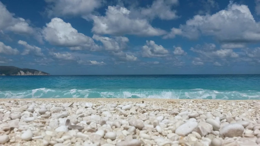 there are rocks on the sand at this beach