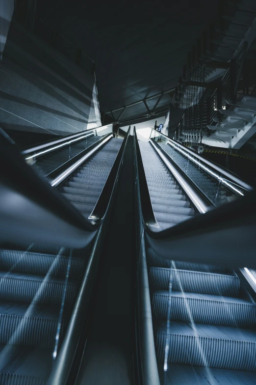 some escalator in a very big building