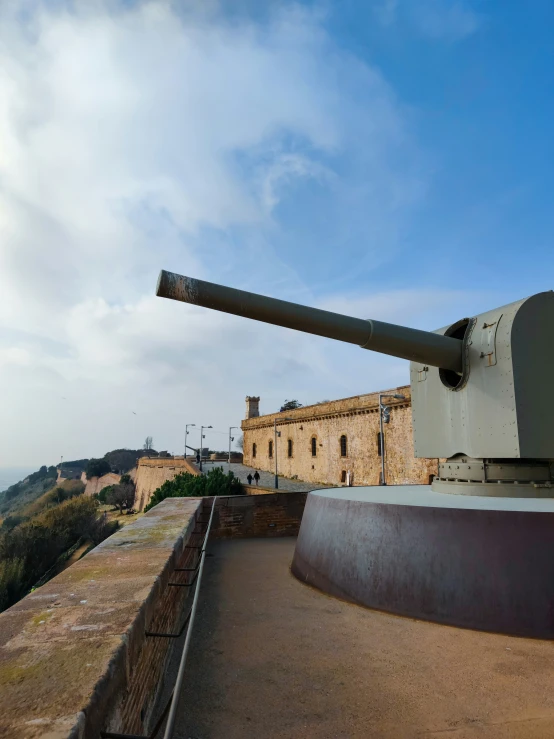 a large tank is shown at the top of a hill