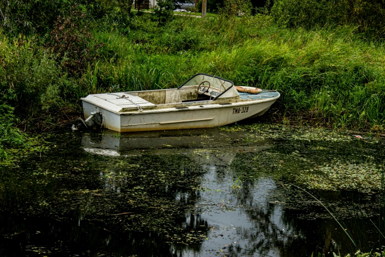 a boat that is sitting in some water