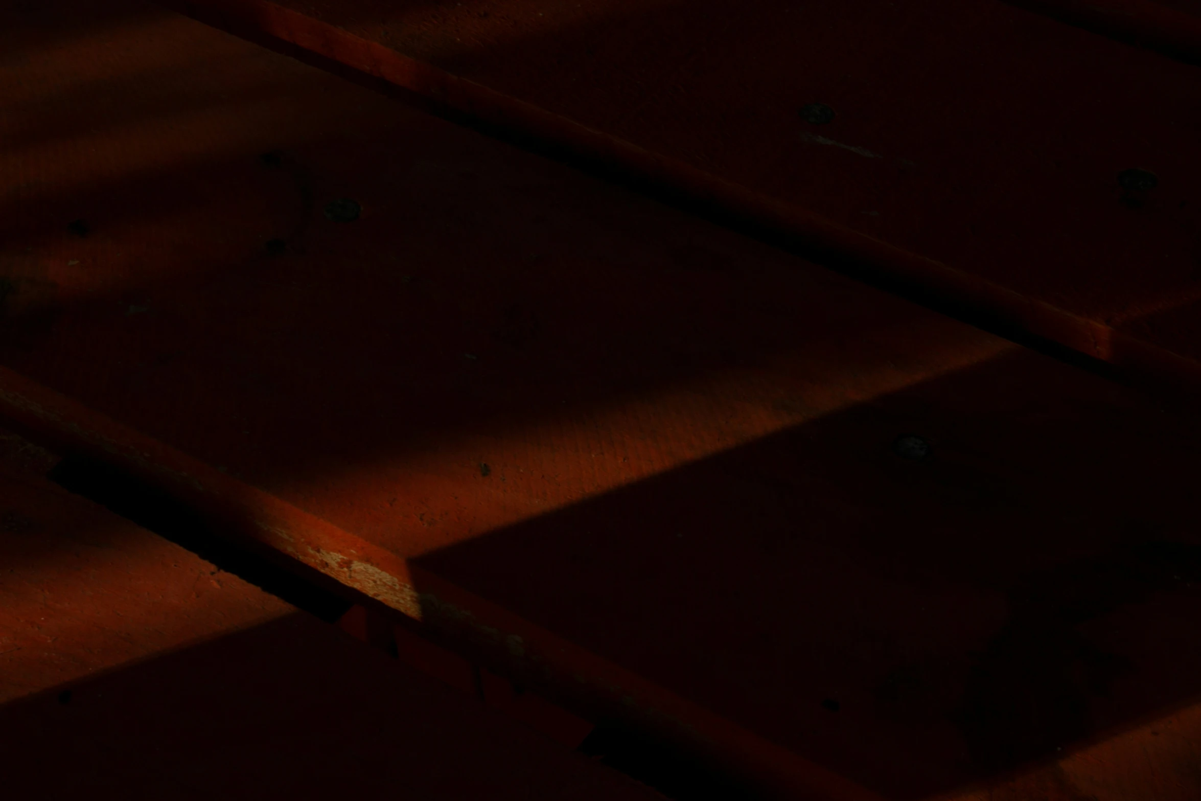 a red and black box sitting on top of a table