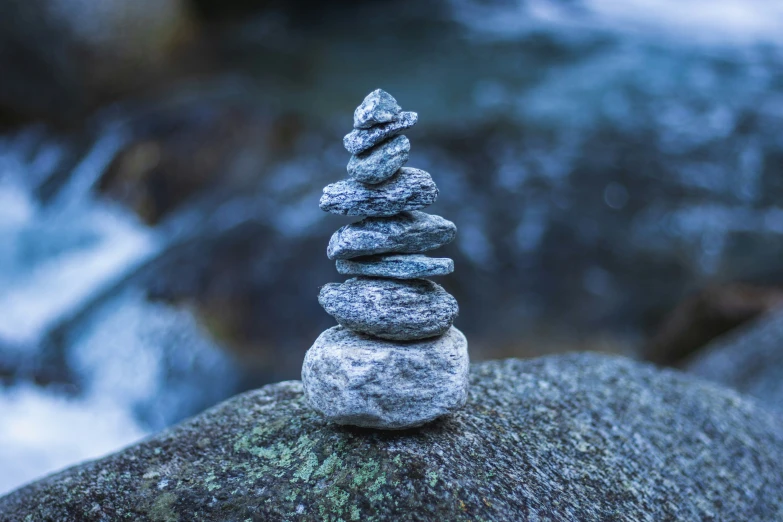 rocks with small stacks sitting on top of them