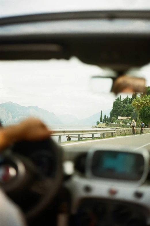 some people riding motorcycles and an open road