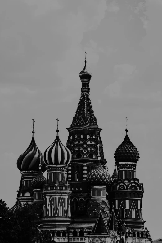 a church with a clock and several towers