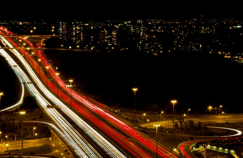 long exposure pograph of city lights and street roadway