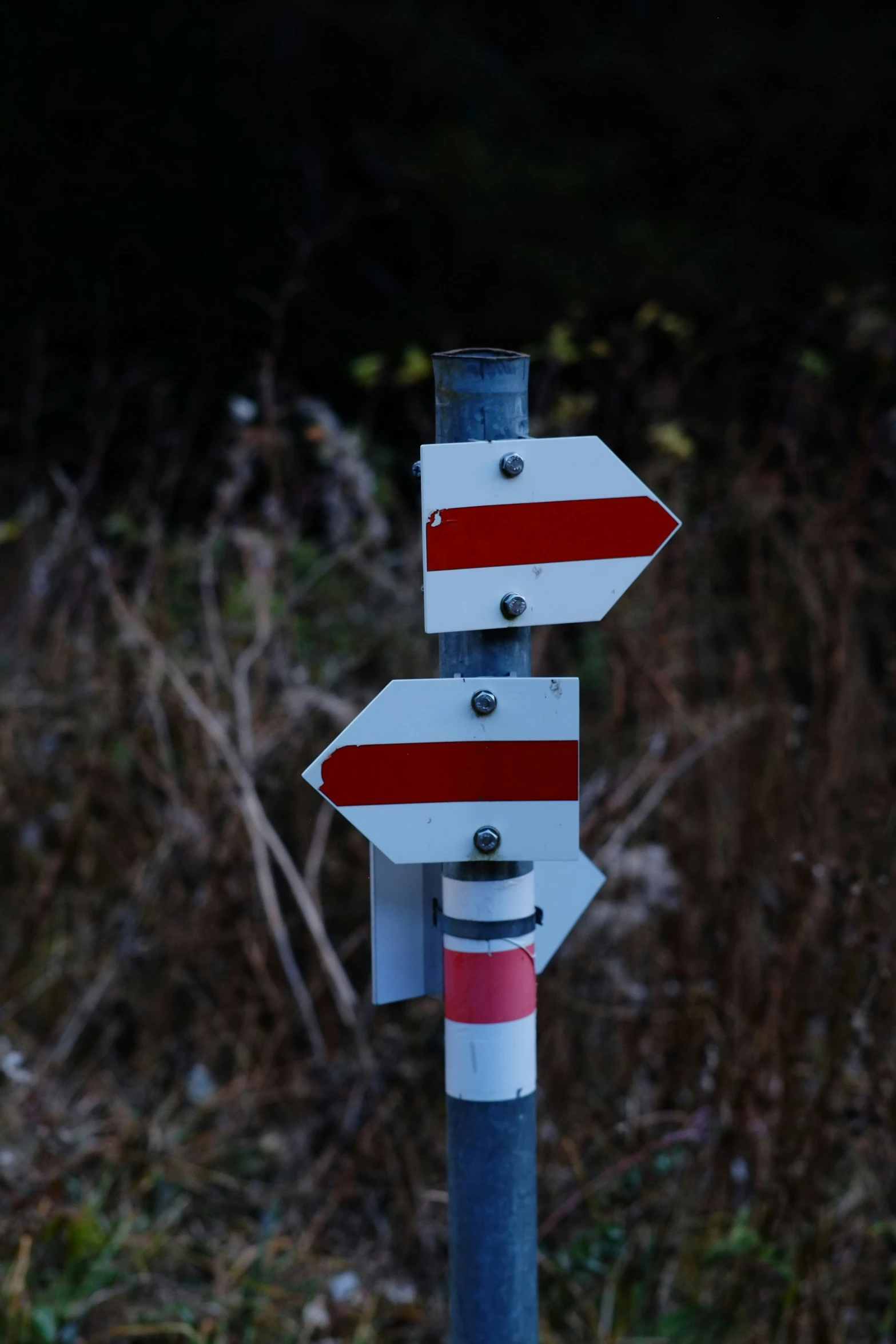 a sign with a red stripe on it