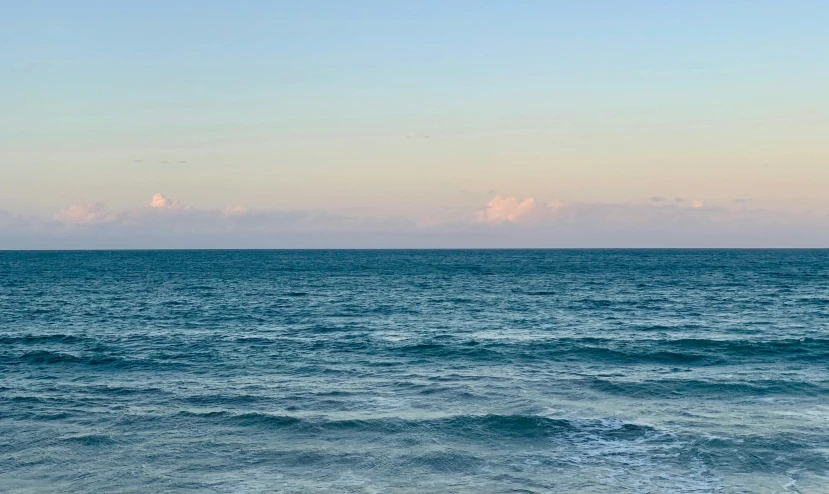 the blue waters are very clear at dusk