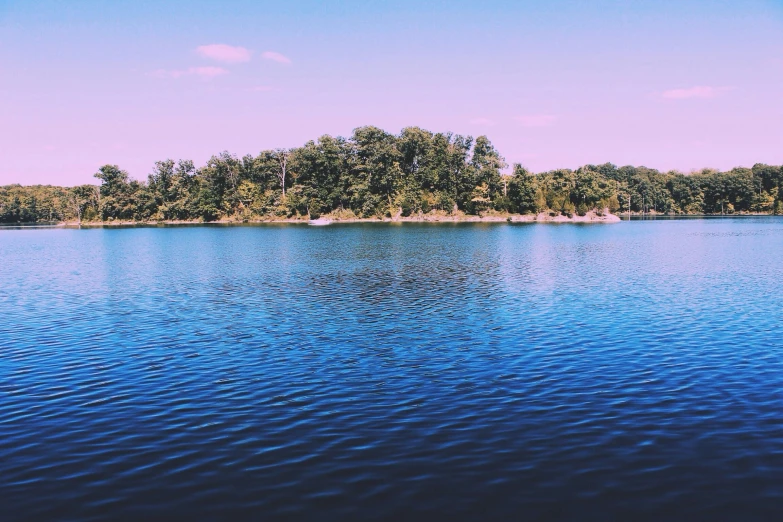 the calm, calm blue water of the lake