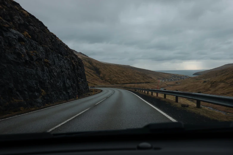 a highway that goes through a mountain side