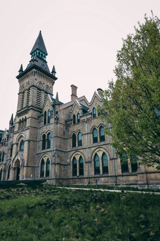 the large building has many windows and towers