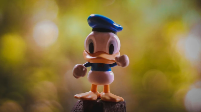 this is a plastic toy that looks like donald duck