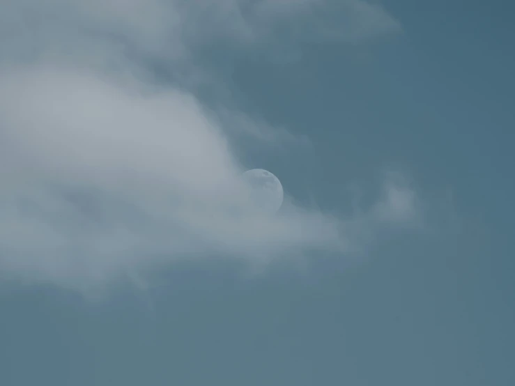 a cloud is shown flying by in the air