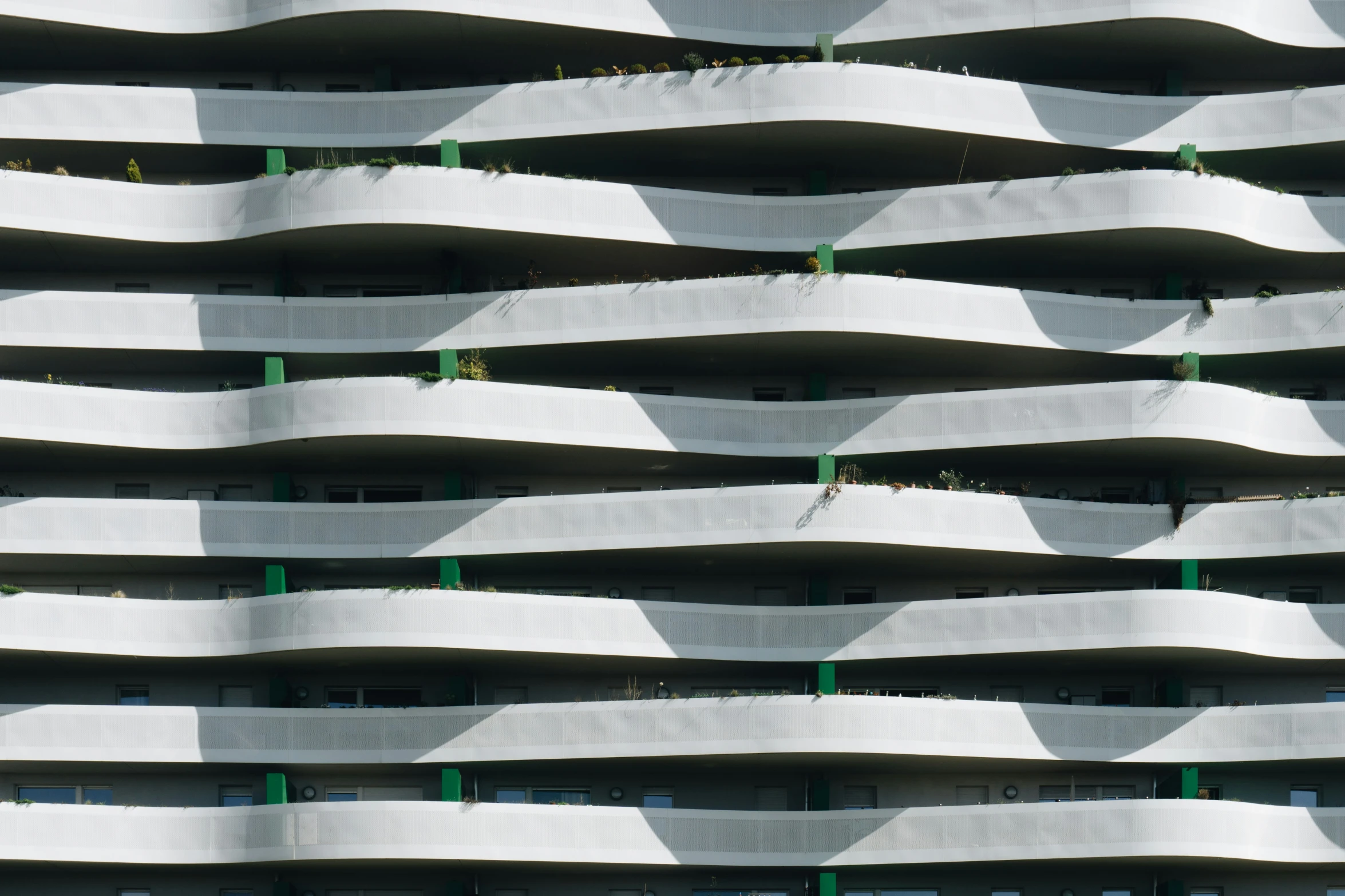 green and white stripes on an architectural building