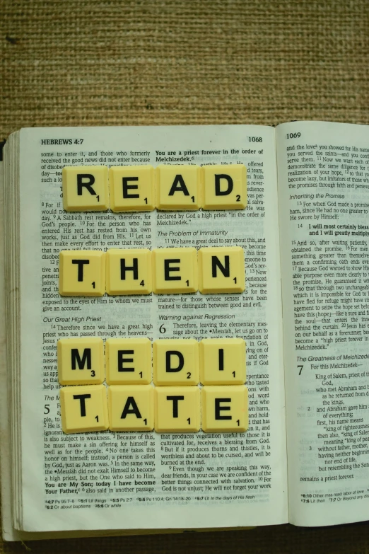a book open to reveal a words that read read then medi tate
