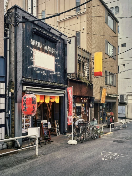 a city street has bikes parked outside the store