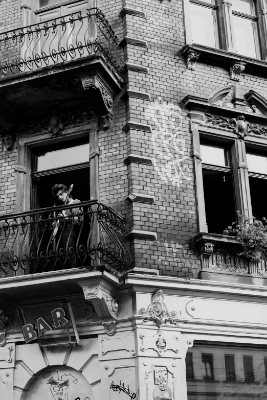 an ornately decorated building with balconies and balconies, as well as graffiti