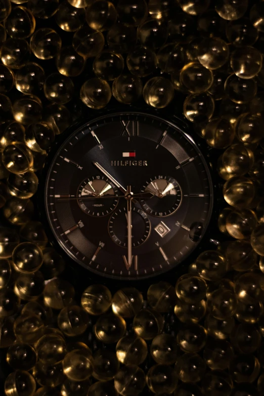 a wall of shiny, glassy spheres is all around this watch