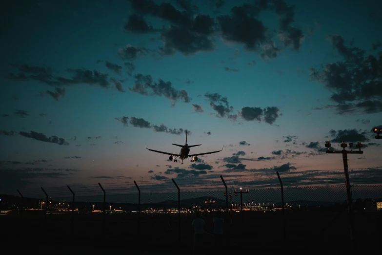 a plane is ascending into the sky above