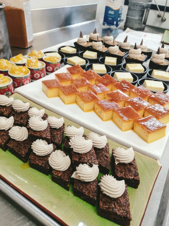 desserts displayed on display in a buffet for purchase