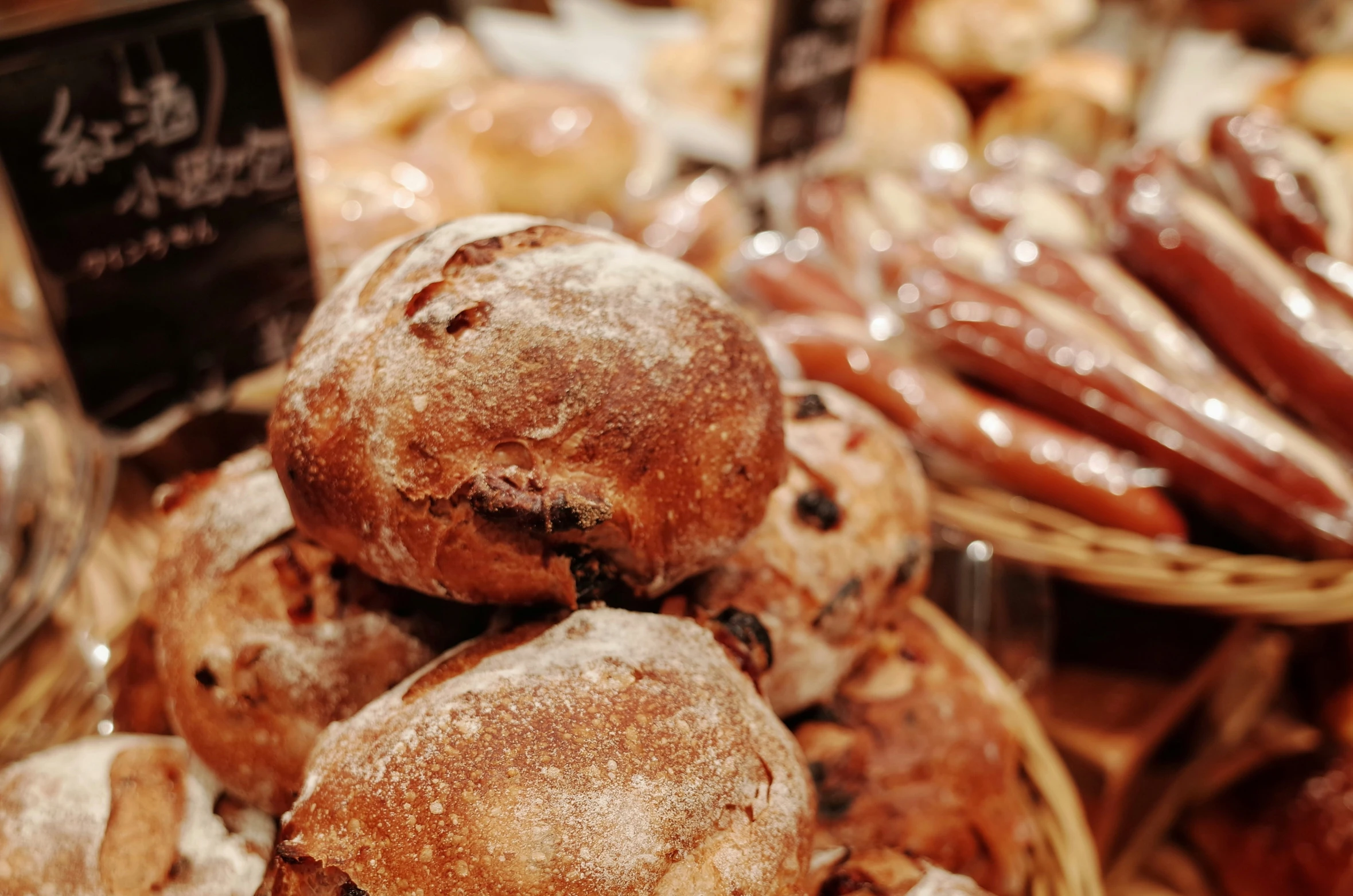 fresh baked goods on display at a bakery