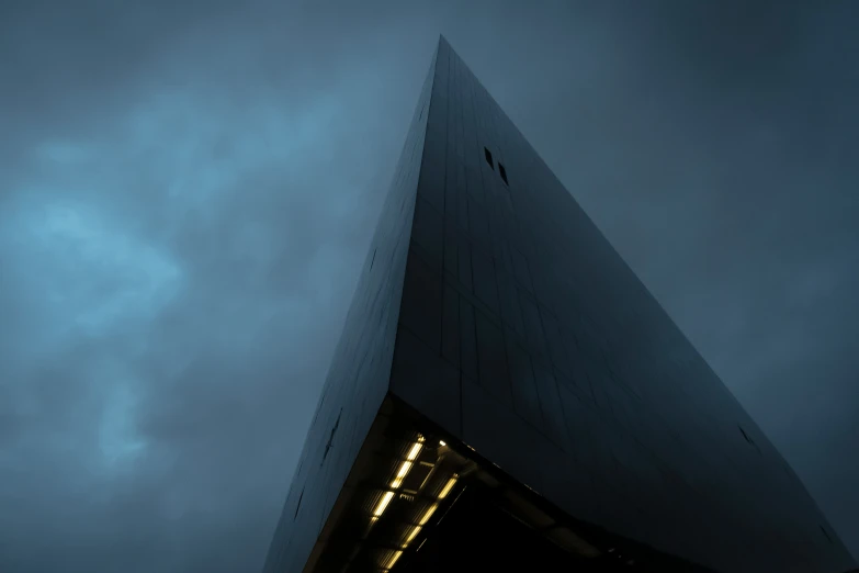 the top of a building with an umbrella sticking out of it