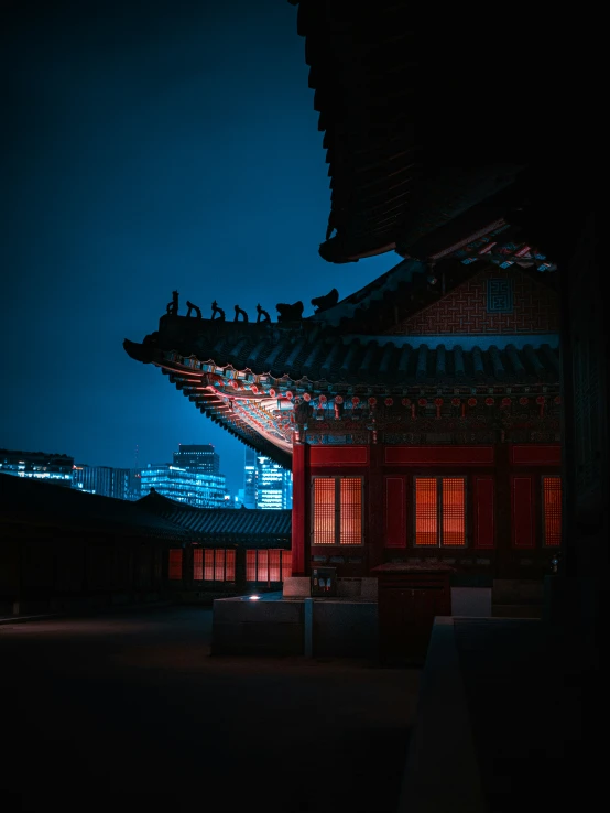 a building with a lot of lights in front of it