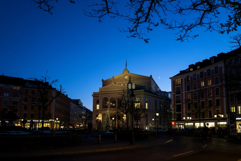 the night sky is illuminated with buildings and lights