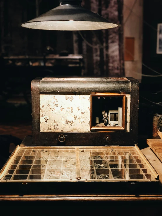 an old time clock in an antique wooden case