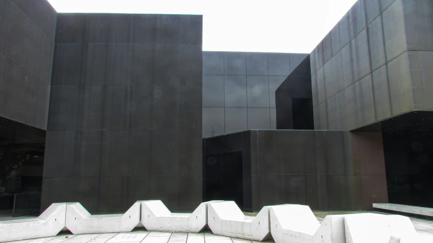 large concrete walls on the outside of a building