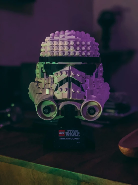 the lego star wars helmet is glowing purple