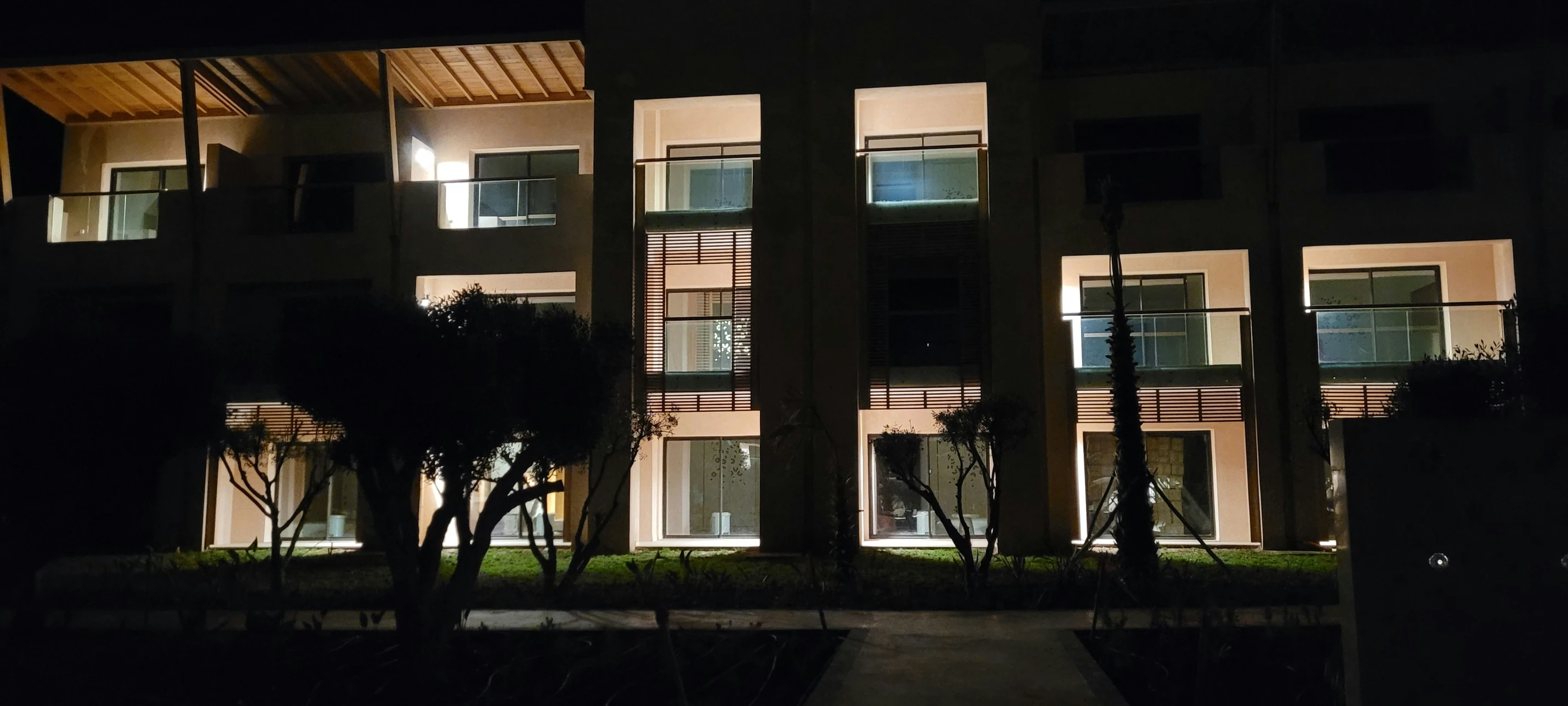 night time view of a two story apartment building