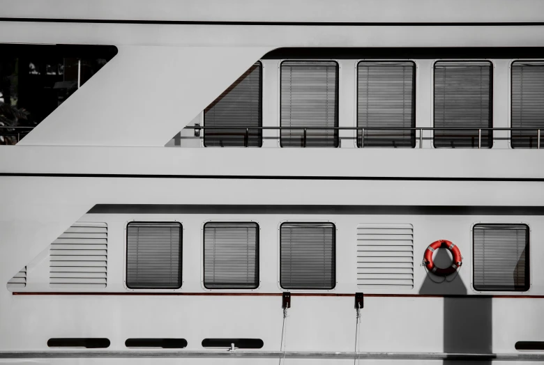 a boat with several windows and a window door