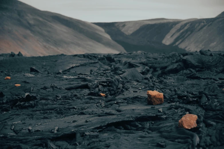 a picture of rocks and dirt at the end of the hill