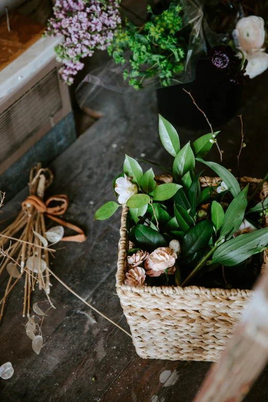 a basket that has some flowers in it