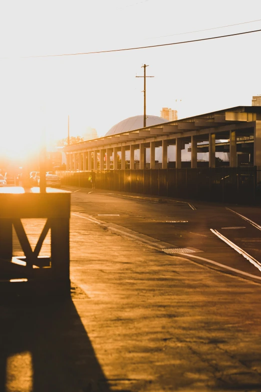 the train yard at dusk has only one person inside