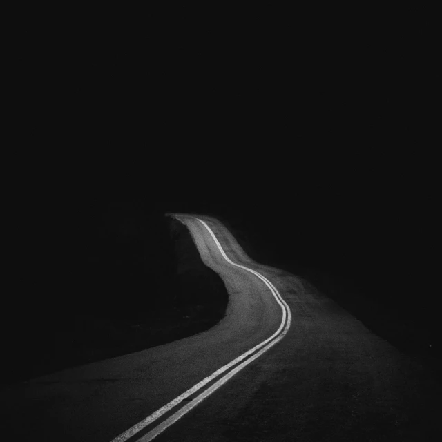 a po of the road that is very dark