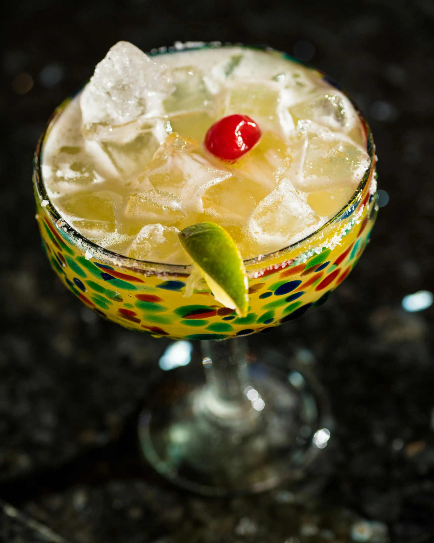 a margarita cocktail with a cherry in it