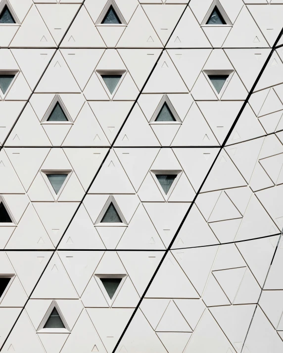 geometricly decorated buildings with triangle shapes on them