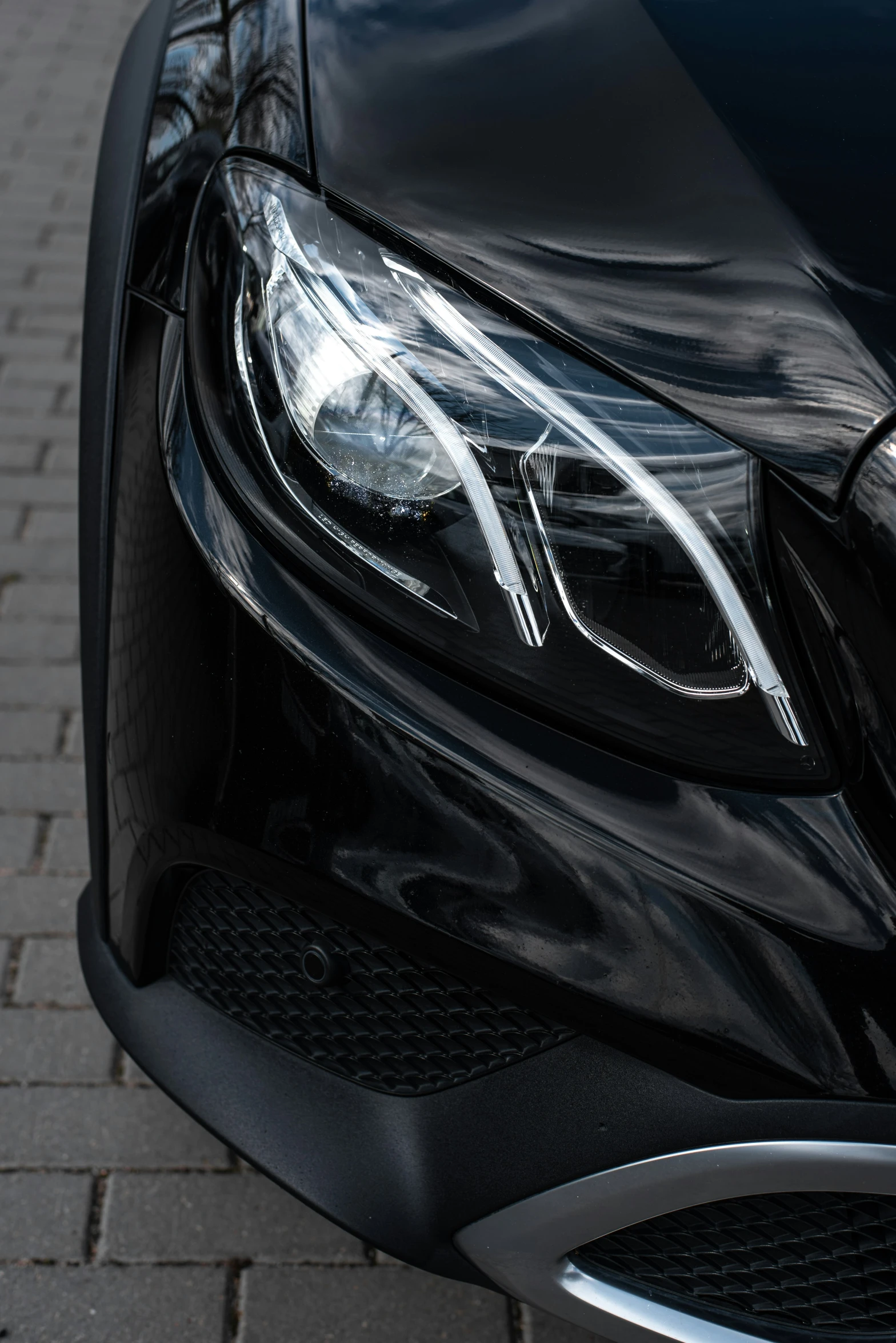 a close up of a car on a street