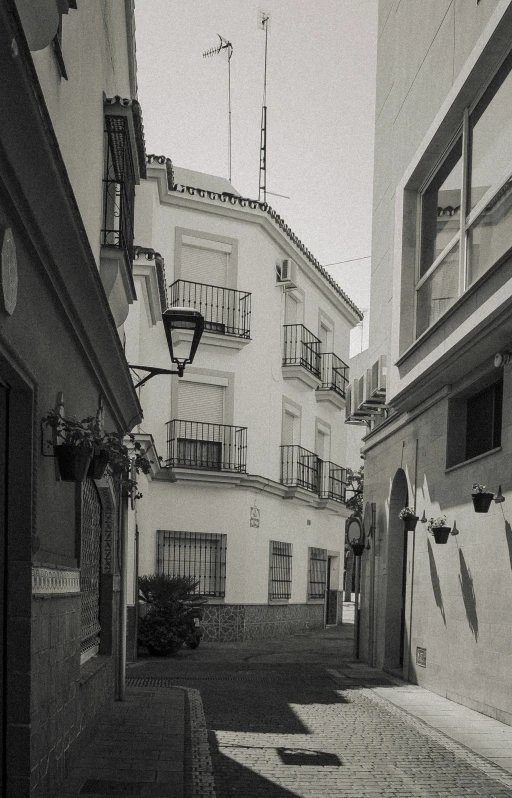 old alley with small buildings in the background