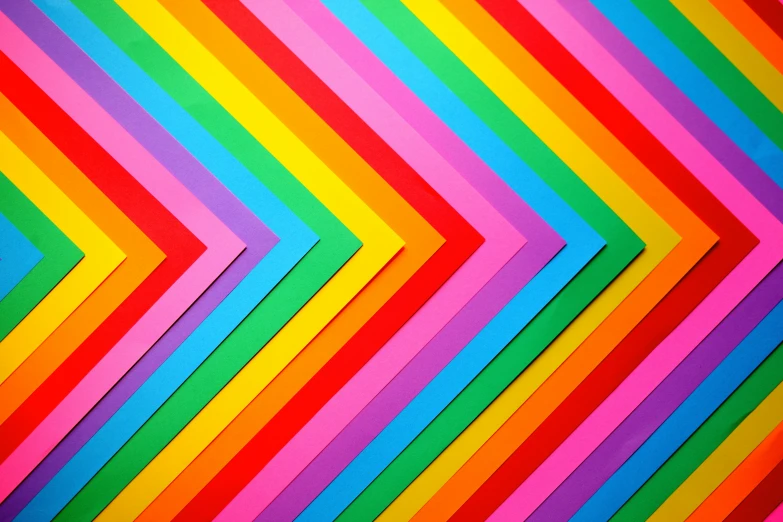 a close up of multi colored folded paper