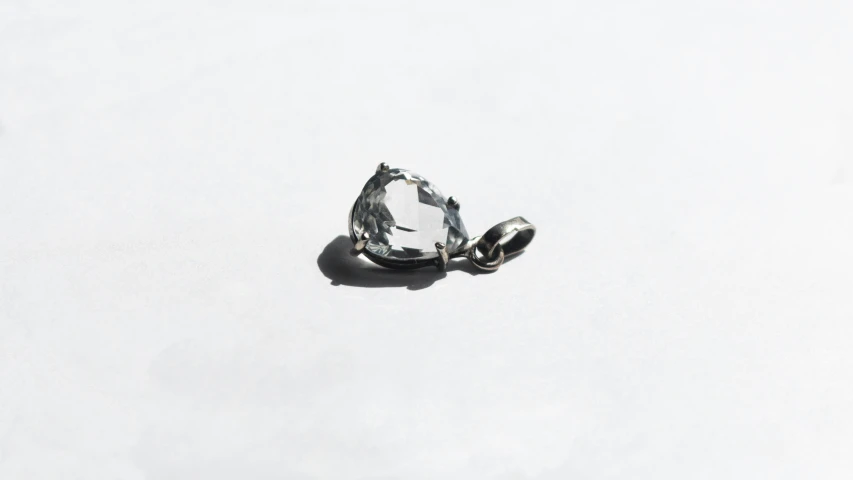 an empty diamond on a white surface