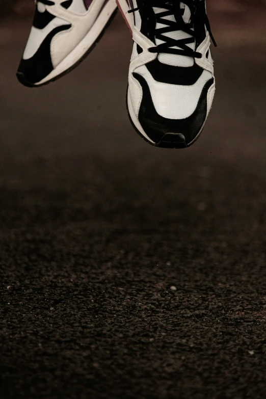 an air jordan shoe hanging from the ceiling