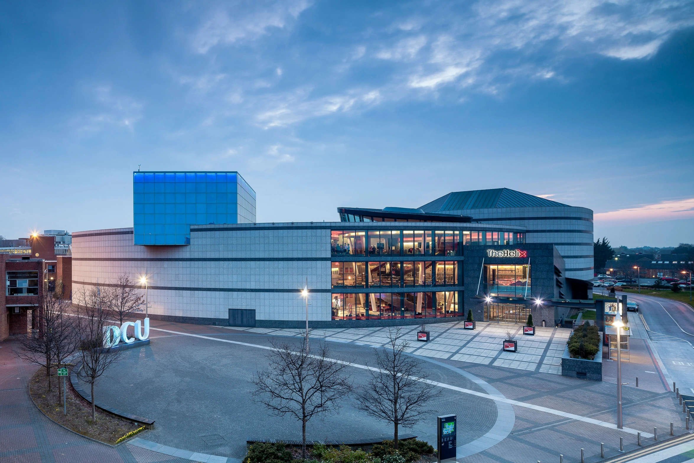 the building with many lights at dusk time