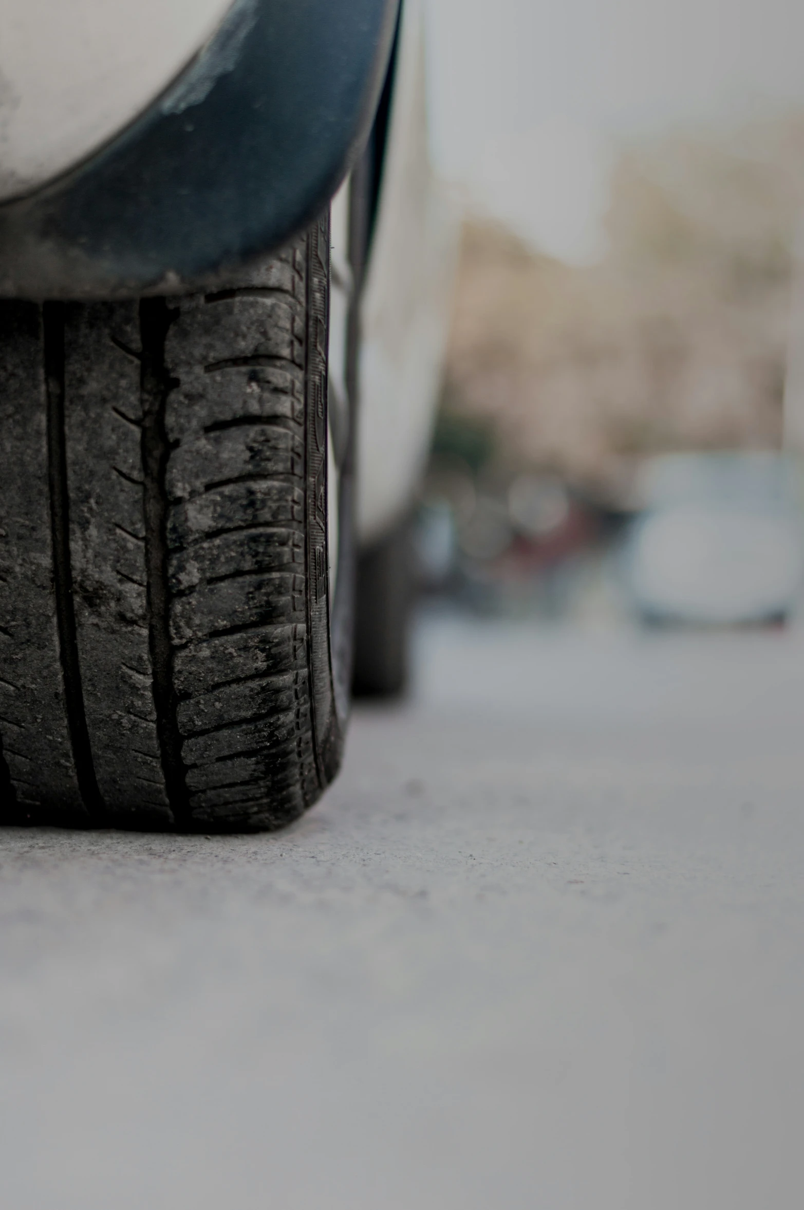 a close up view of a tire on a car