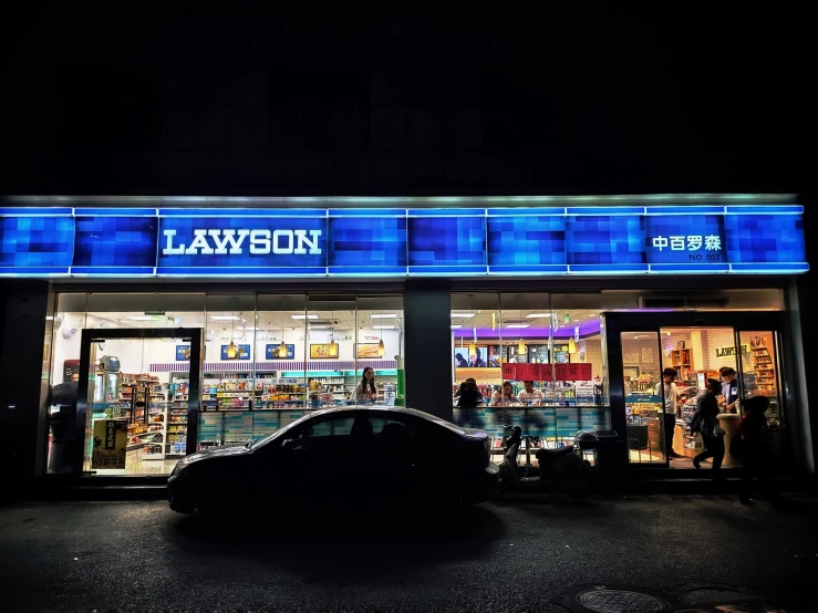 a black car in front of the lawwin department