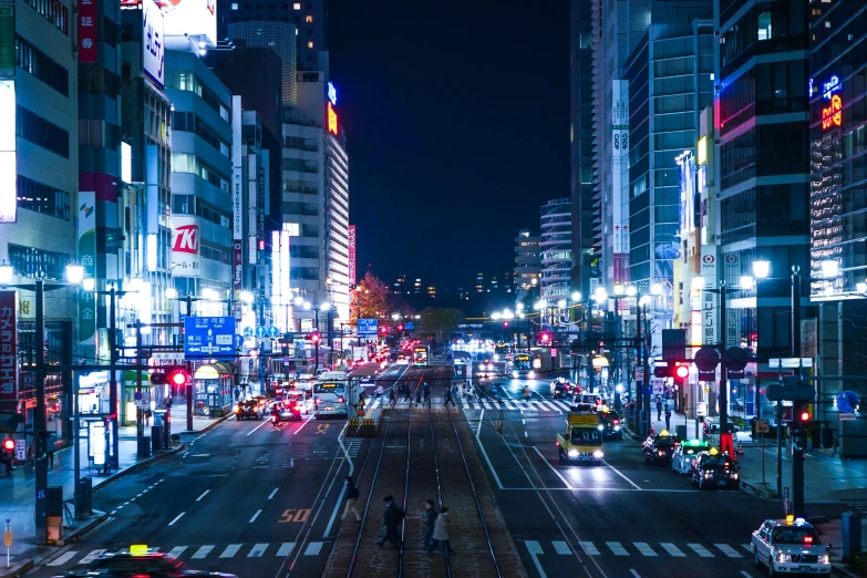 a view of a busy city street at night